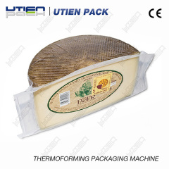 Round cheese vacuum packing machine