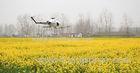 Environment friendly Unmanned Crop Dusting Helicopter Aerial Spraying UAV for Farming