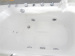 Acrylic corner whirlpool bathtub with handle
