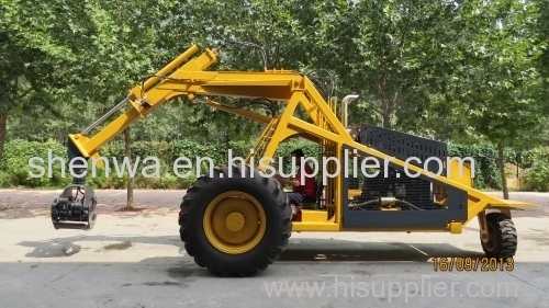three wheel logger with swing grapple and telescopic boom