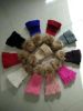 Women knitted beanie hat with big raccoon fur ball