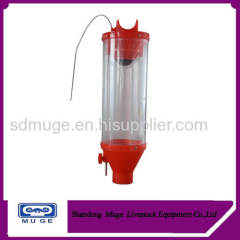 Pig feed volume dispenser for pig feeding system