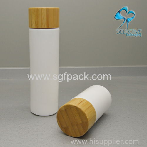 white porcelain vase glass bottle with bamboo cap or pump cosmetics bamboo packaing