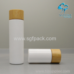 white porcelain vase glass bottle with bamboo cap or pump cosmetics bamboo packaing