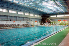 Swimming pool construction with steel space frame structure