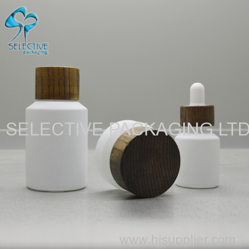 white coating inclined shoulder glass cosmetic packaging lotion bottle and cream jar series with ash wood screw lids