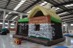 Stone age with dinosaur inflatable jumping castle with slide