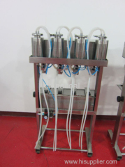 Semi Automatic 4-heads Vacuum Perfume Filler Liquid Filling Machine