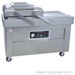 Double chamber vacuum sealer