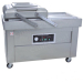 Double chamber vacuum sealer