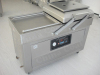 Double chamber vacuum sealer