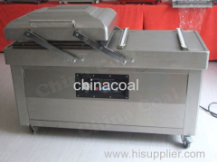 Double chamber vacuum sealer