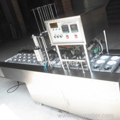 Automatic cup filling and sealing machine