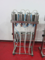 Semi Automatic 4-heads Vacuum Perfume Filler Liquid Filling Machine liquid filling machine liquid filler