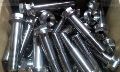 Titanium hexagon head screws DIN 912 with holes on the head