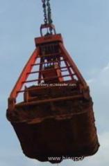 Mechanical nickel ore grab for sticky materials