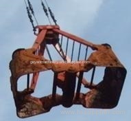 Mechanical nickel ore grab for sticky materials