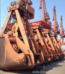 Mechanical nickel ore grab for sticky materials