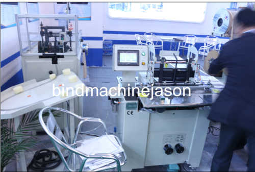 Calendar and notebook double wire bind machine with hanger part