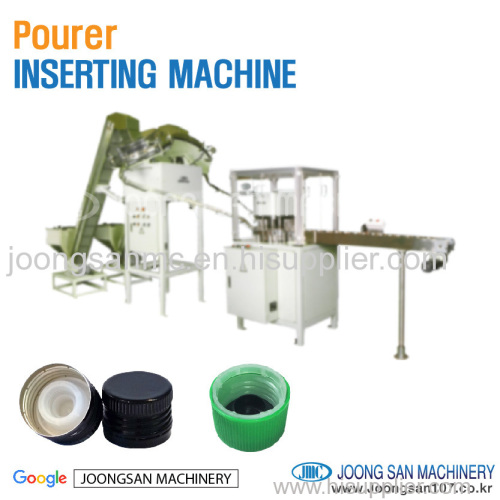 Pourer cap inserting machine