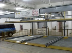 Automated two level puzzle parking system