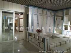 Bright colour wood wardrobe and chest in same color with other furniture in home