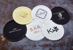 Round absorbant paper coasters with printed log