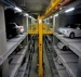 Vertical car lifter for parking garage