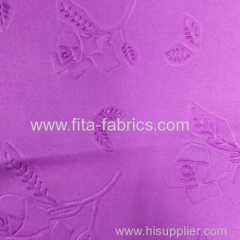 Embossed fabric for garments