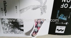 Kiss cut sticker saddle stitched brochure