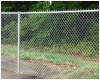 top barbed wire/white chain link fence