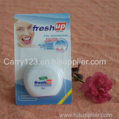 Round shape dental floss dispenser 50m mint waxed dental floss super thin floss with Terylene Floss OEM accept