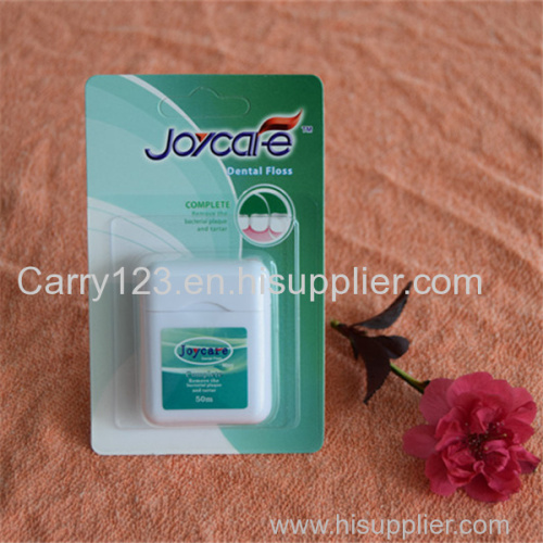 Square shape dental floss dispenser 50m Cool mint flavor waxed Can customized logo blister card packing