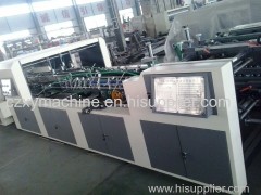 Fully automatic corrugated paperboard box chest folding and gluing making machine