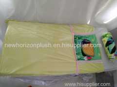 plush blanket with stuffed toy