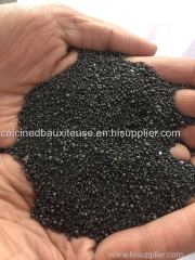 Hard and unyielding abrasive bauxite beads