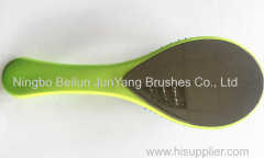 round plastic brush with cushion and coated with rubber paint