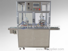 Automatic cuvettes filling and sealing machine