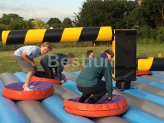 Wipeout obstacle inflatable sweeper game