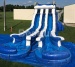 Giant double water slide with pool