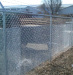 Chain Link Fence With Barbed Wire Arms