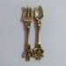 metal souvenir spoons and forks