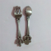 metal souvenir spoons and forks