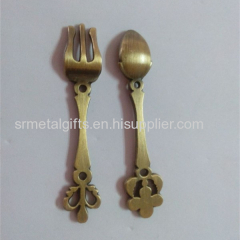 Metal crafted souvenir spoon and fork set