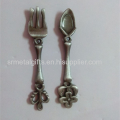 Metal crafted souvenir spoon and fork set