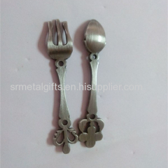 Metal crafted souvenir spoon and fork set