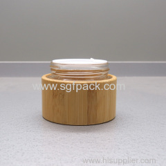 Glass cream jar wooden jar