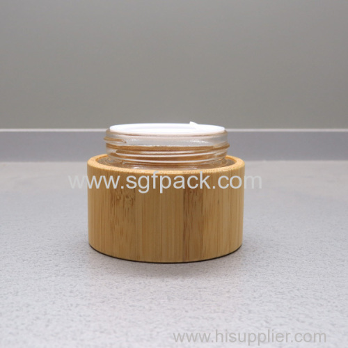 Glass cream jar wooden jar