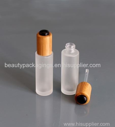 Essential oil glass bottle with bamboo dropper cover