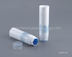 Cosmetic tubes with silicone massage brushes